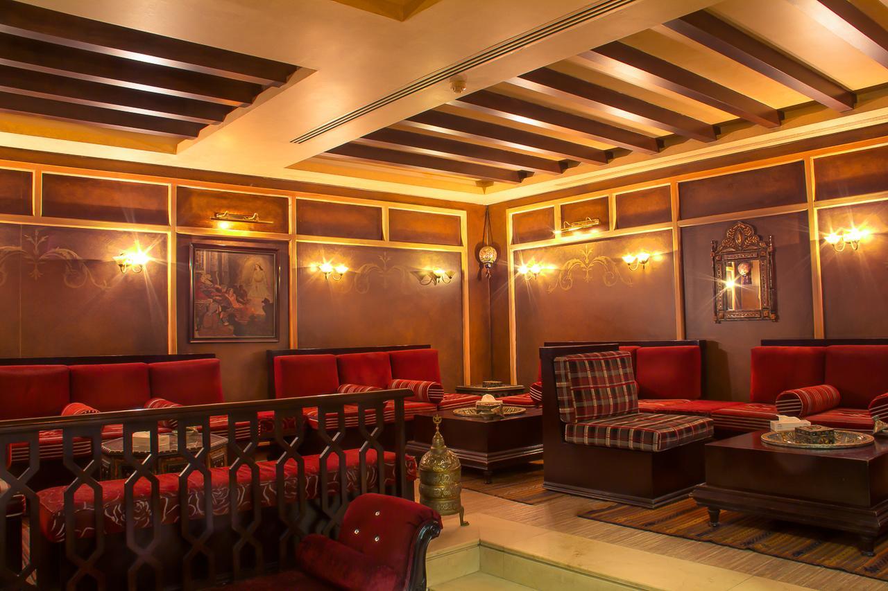 사우전드 나이츠 호텔 암만 외부 사진 A coffeehouse in Cairo, Egypt